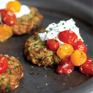 Zucchini Cakes Recipe with Herbed Goat Cheese and Roasted Tomatoes Image